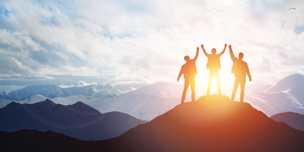 Silhouette,Of,The,Team,On,The,Mountain.,Leadership,Concept Triathlon Partners Our objective is to maximize after tax wealth. To achieve this we maximize cash flow with limited volatility through asset and product diversification.